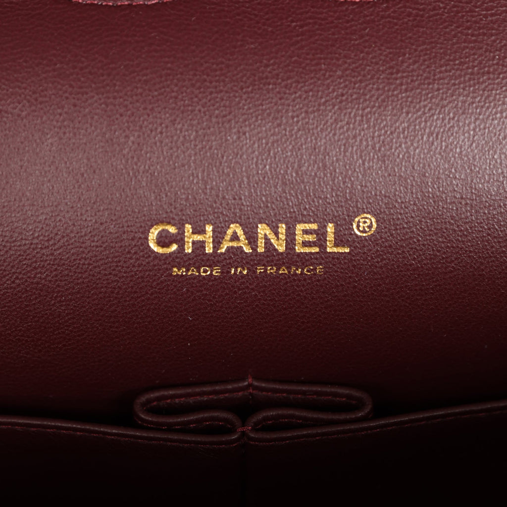 Chanel Maxi Classic Double Flap Black Caviar Gold Hardware