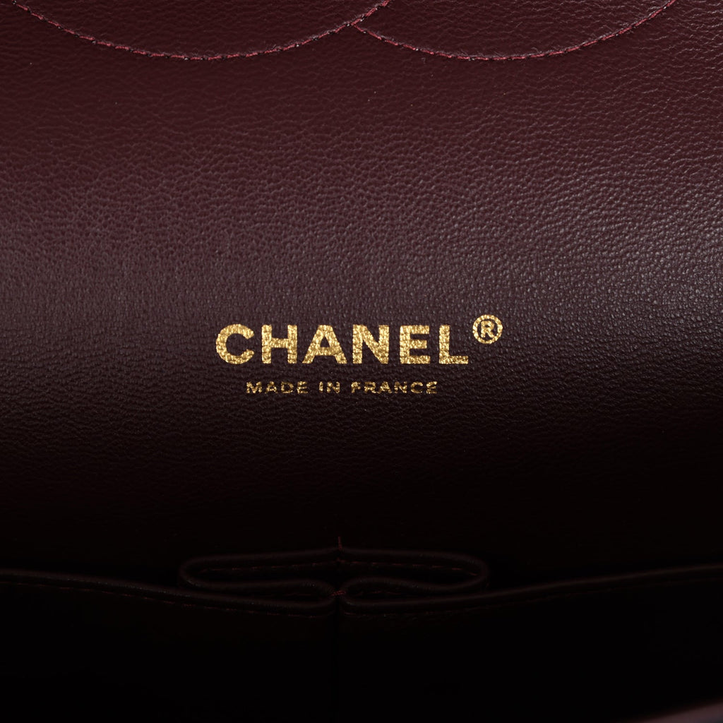 Chanel Maxi Classic Double Flap Bag Black Caviar Gold Hardware