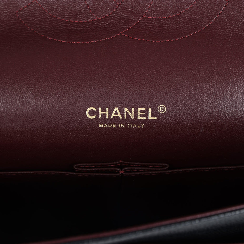 Chanel Maxi Classic Double Flap Bag Black Caviar Gold Hardware