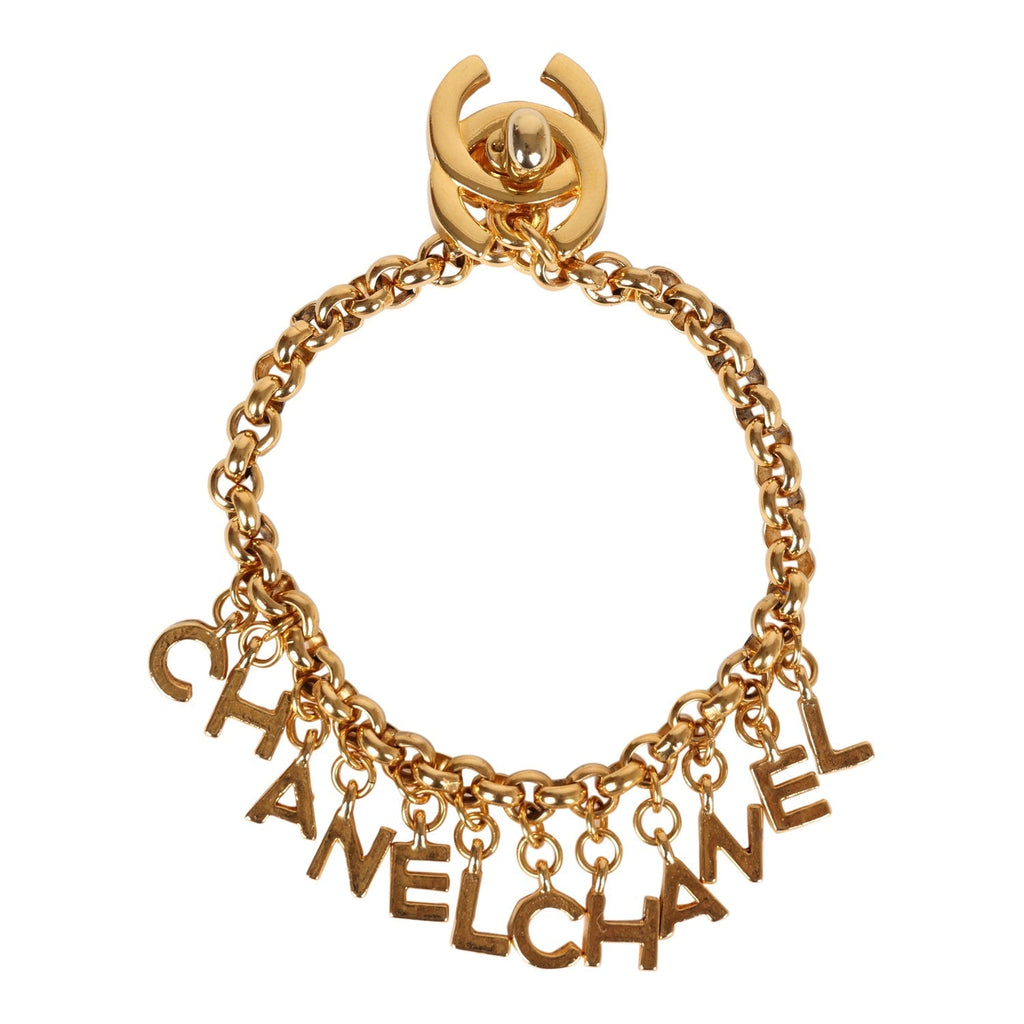 Chanel Vintage 24K Gold Plated "Chanel" Logo Charms Turnlock Bracelet