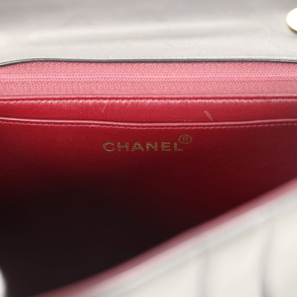 Chanel Vintage Jumbo Mademoiselle Vertical Flap Black Lambskin Gold Hardware