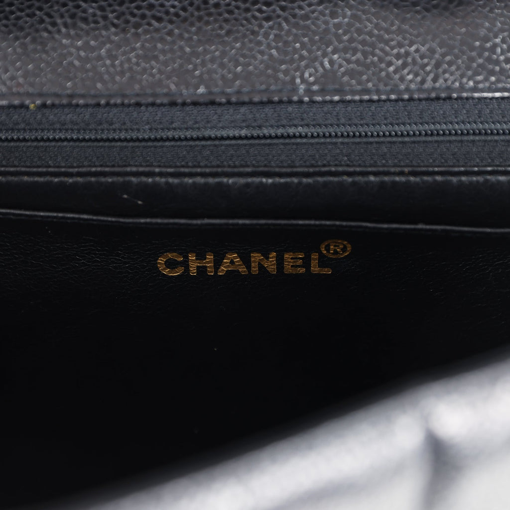 Chanel Vintage Jumbo Mademoiselle Vertical Flap Black Caviar Gold Hardware