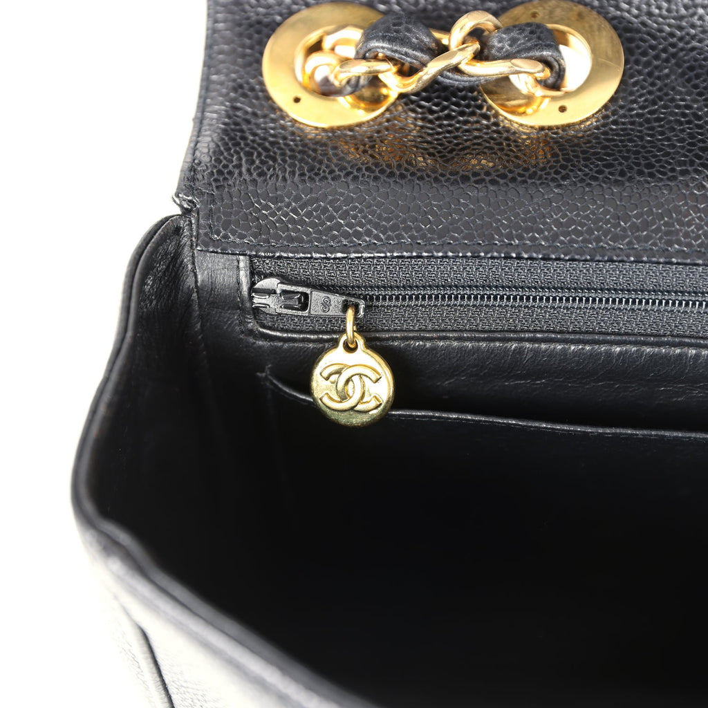 Chanel Vintage Jumbo Mademoiselle Vertical Flap Black Caviar Gold Hardware