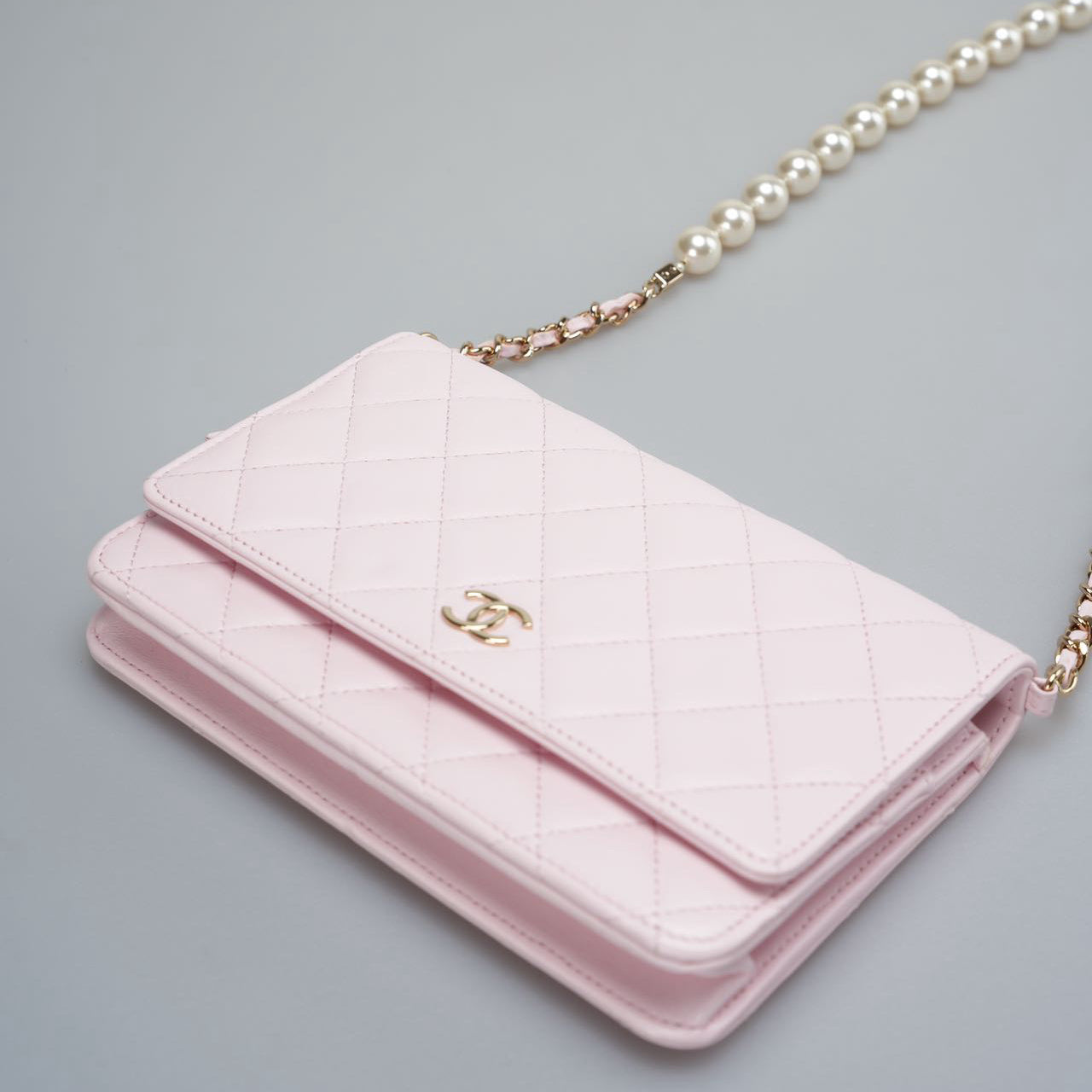 Chanel Baby Pink Wallet on Chain (WOC) in Quilted Lambskin with Pearl Chain – Gold Hardware
