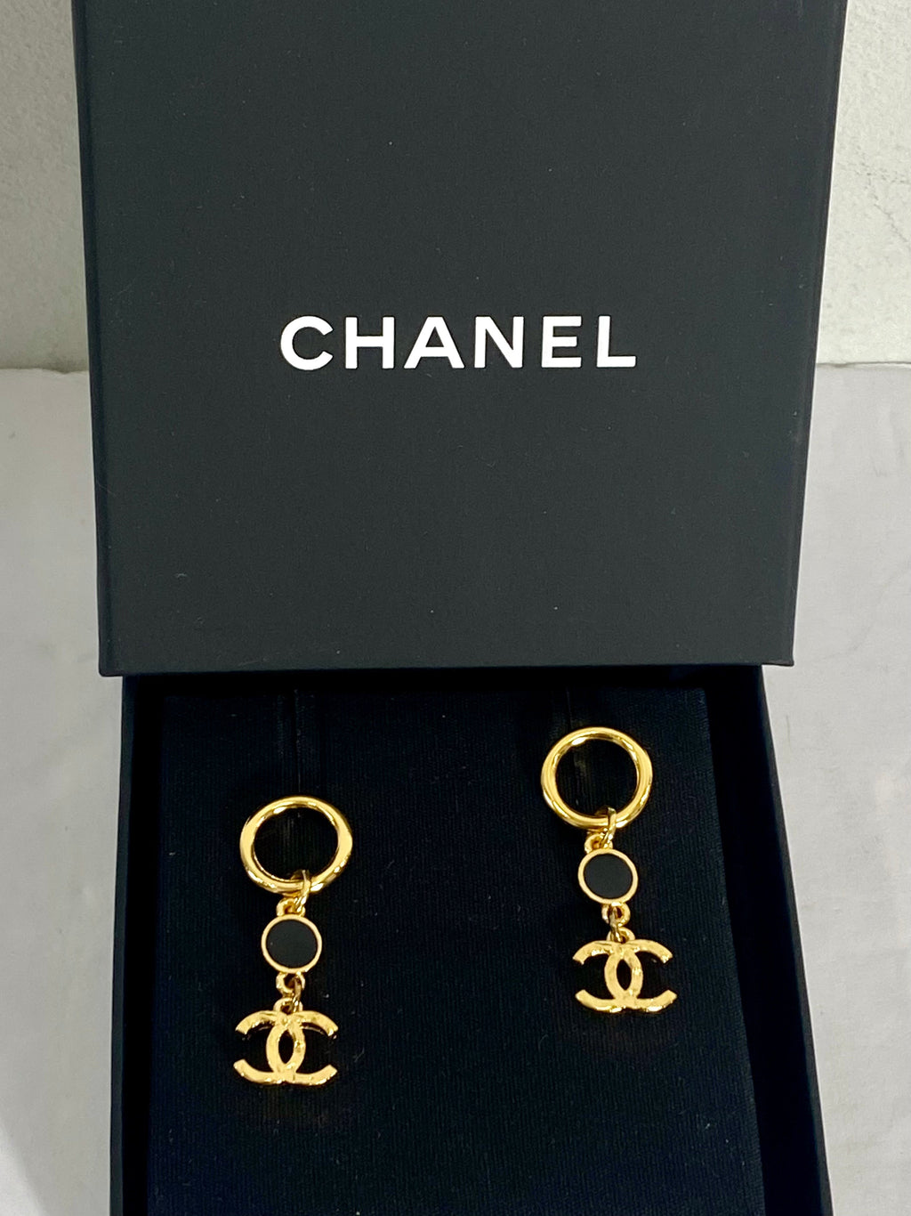 CHANEL GOLD TONE BLACK ENAMEL DANGLE EARRINGS