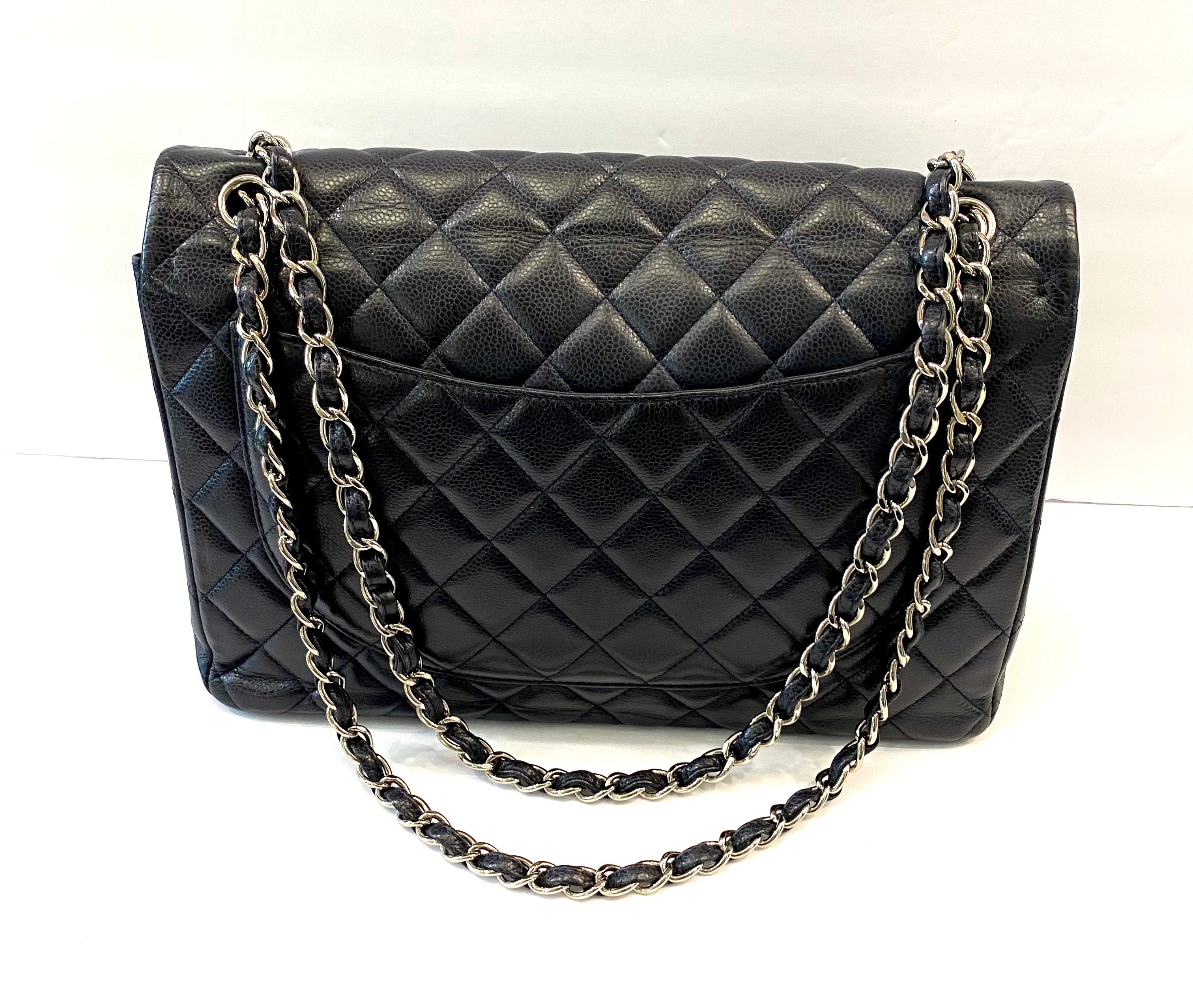 CHANEL CAVIAR QUILTED MAXI DOUBLE FLAP BAG IN NAVY