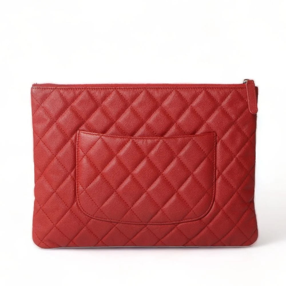 CHANEL QUILTED CAVIAR O CLUTCH BAG