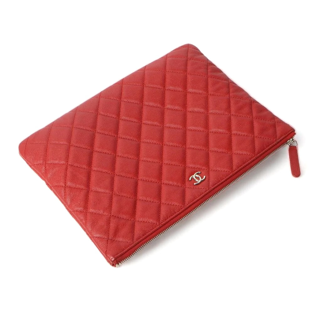 CHANEL QUILTED CAVIAR O CLUTCH BAG