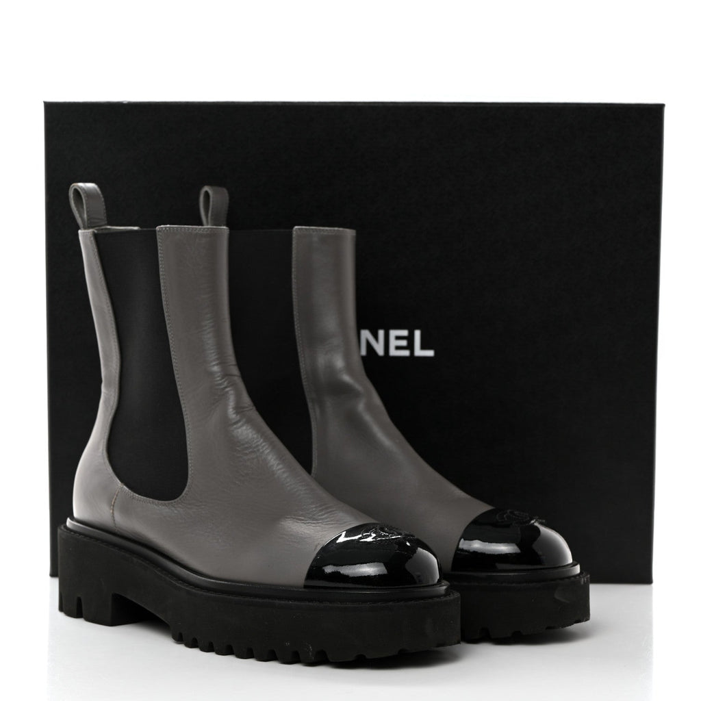 CHANEL CC CRUMPLED CALFSKIN PATENT CAP TOE CHELSEA BOOTS