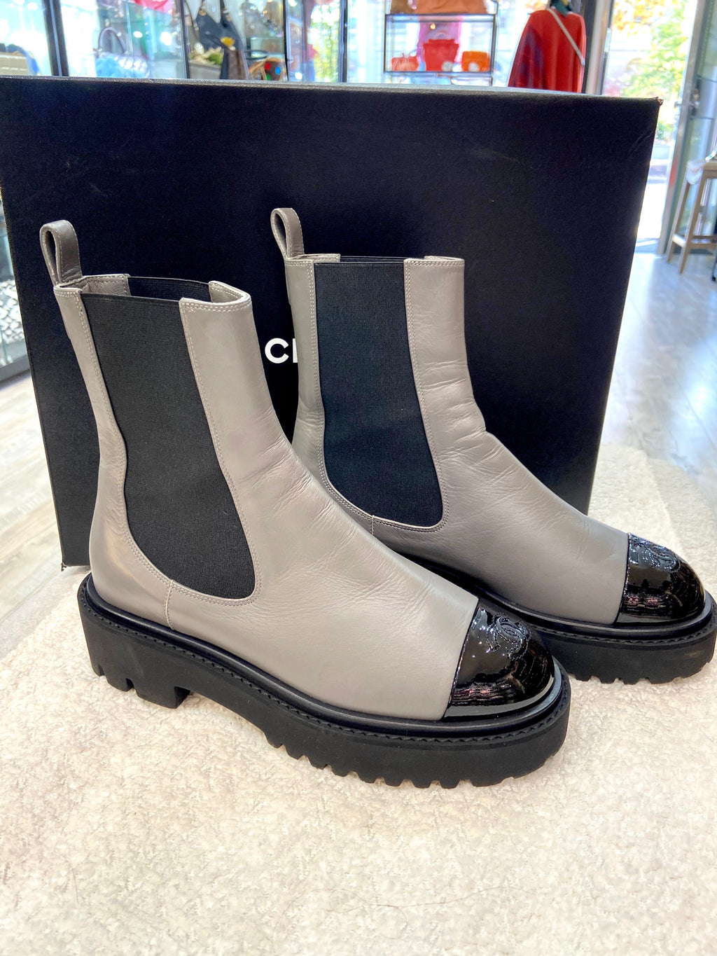 CHANEL CC CRUMPLED CALFSKIN PATENT CAP TOE CHELSEA BOOTS