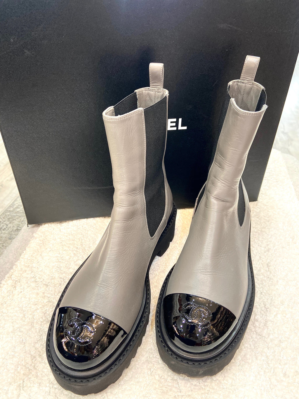 CHANEL CC CRUMPLED CALFSKIN PATENT CAP TOE CHELSEA BOOTS