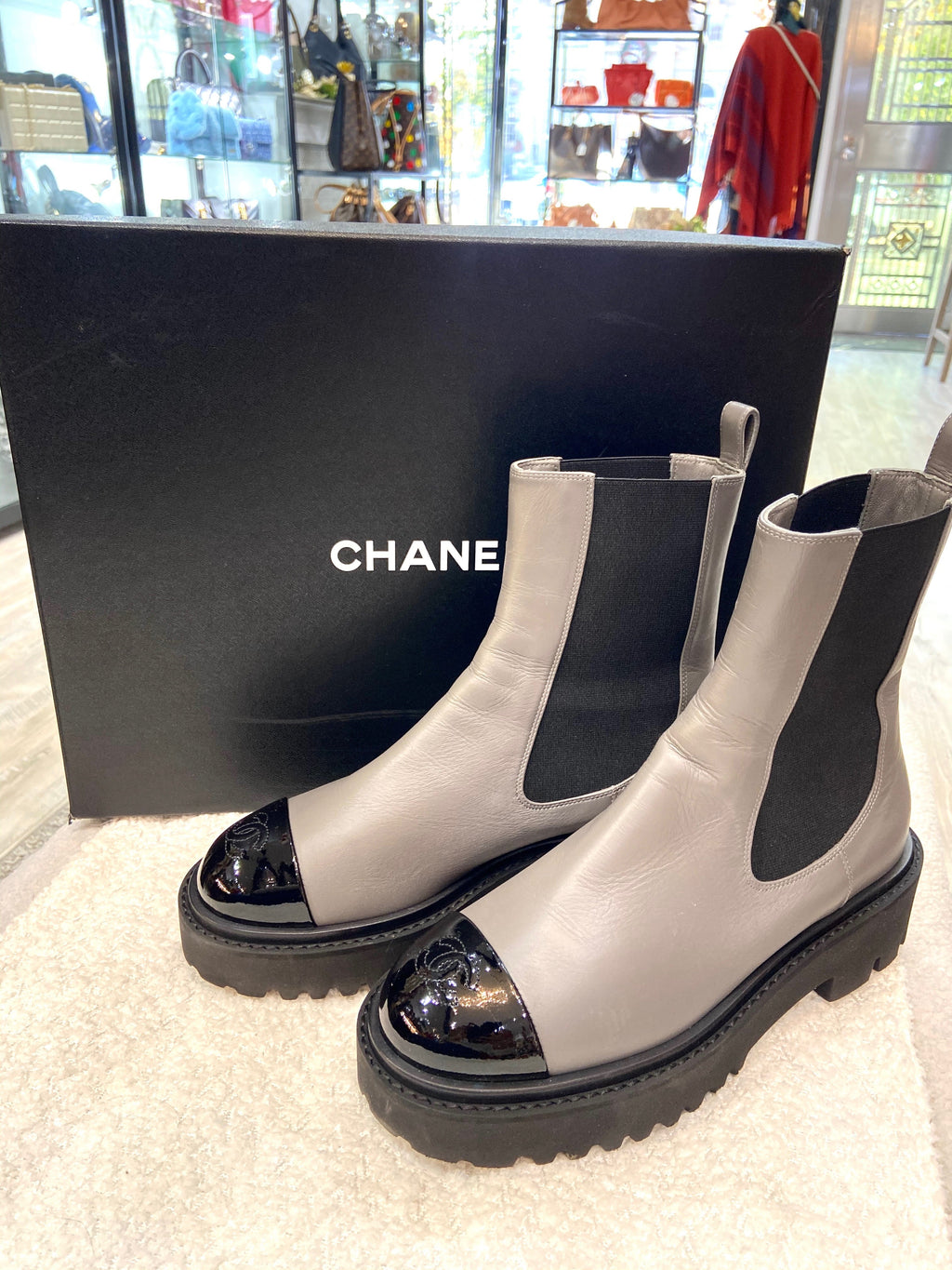 CHANEL CC CRUMPLED CALFSKIN PATENT CAP TOE CHELSEA BOOTS
