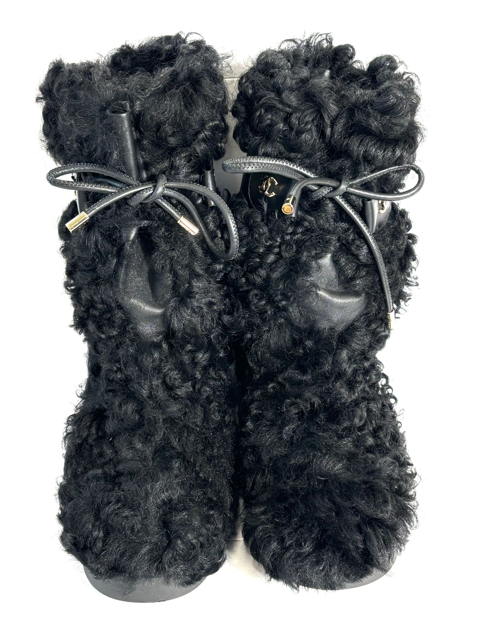 CHANEL INTERLOCKING CC LOGO SHEARLING BOOTS