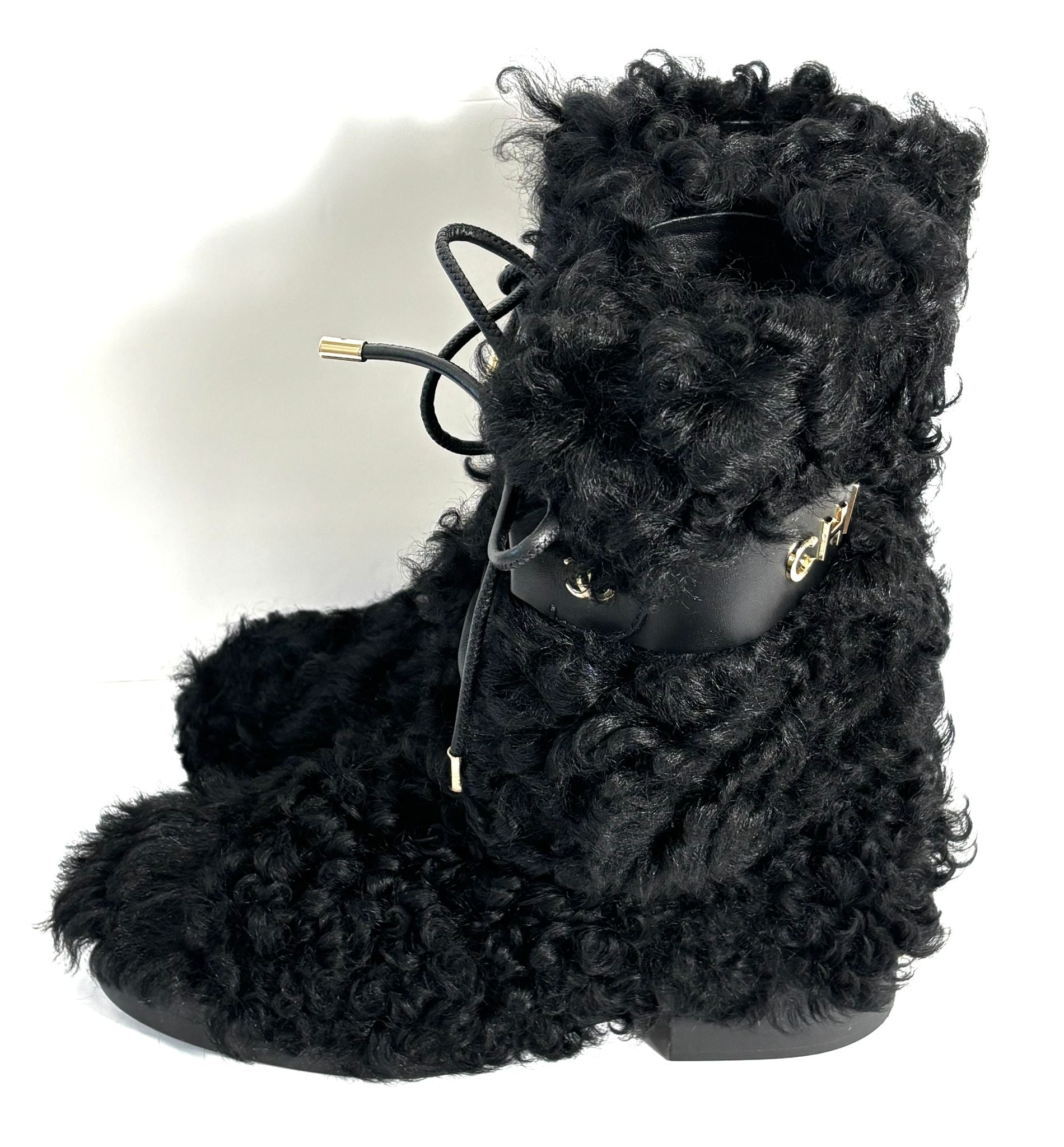 CHANEL INTERLOCKING CC LOGO SHEARLING BOOTS