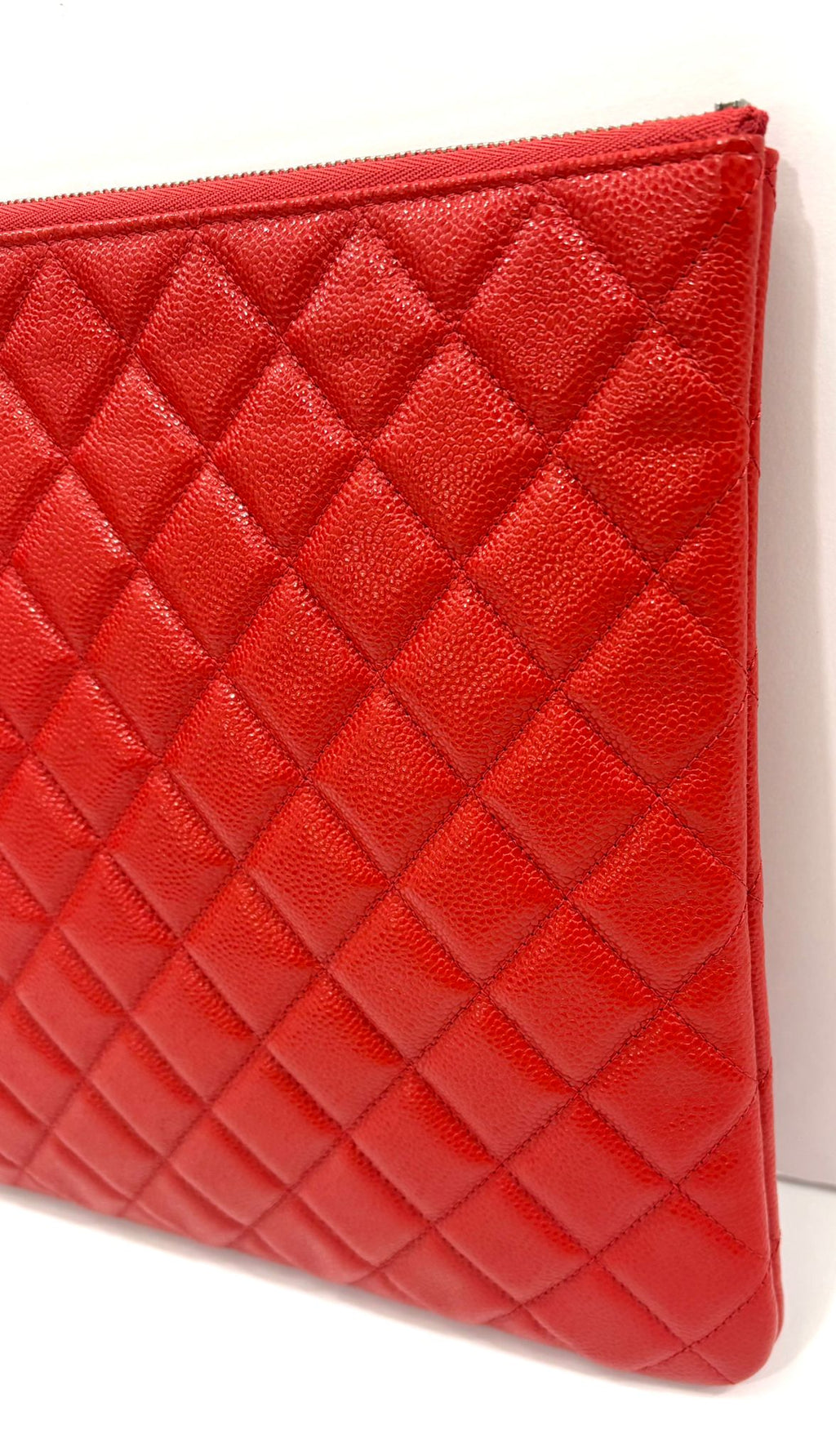 CHANEL QUILTED CAVIAR O CLUTCH BAG