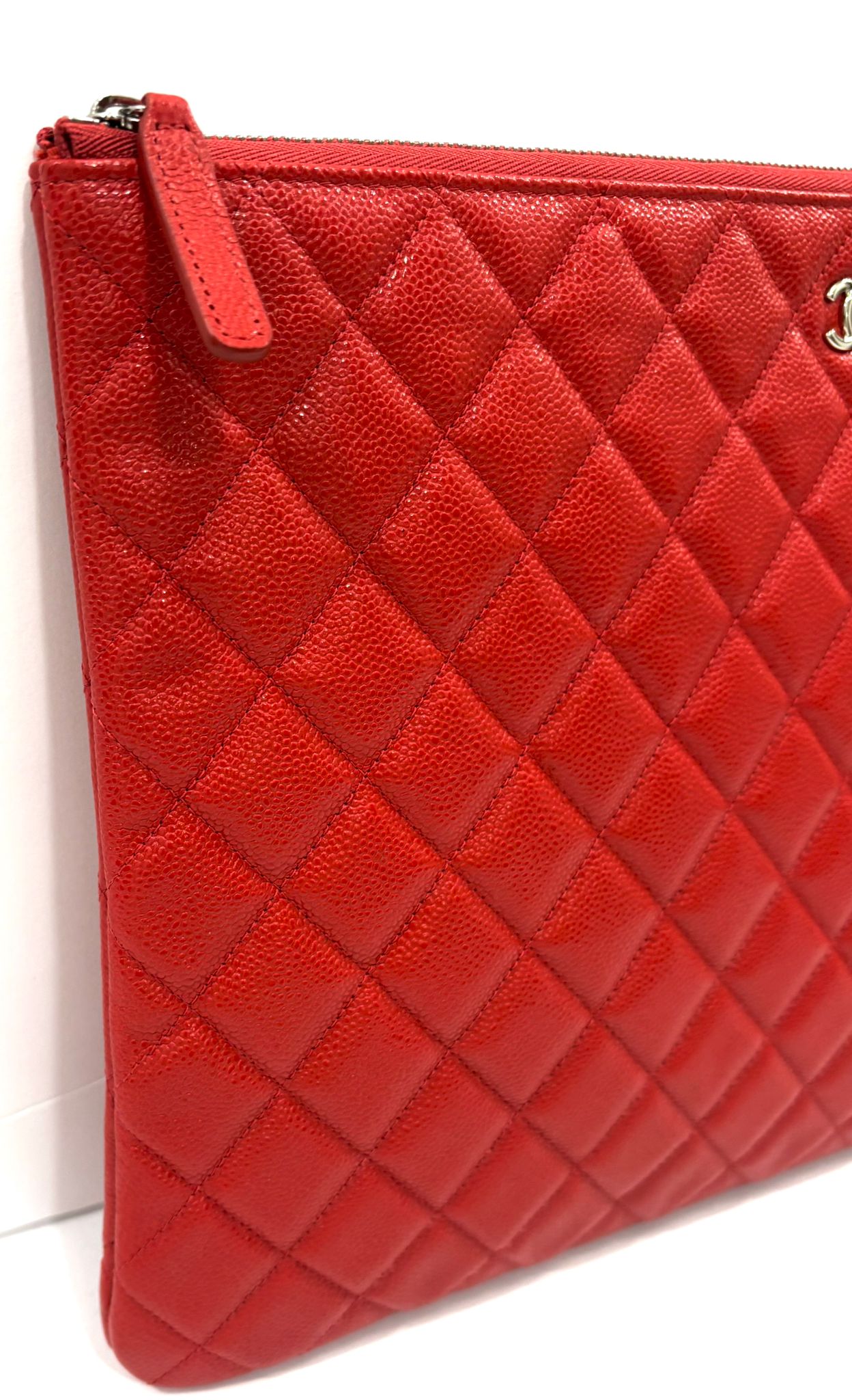 CHANEL QUILTED CAVIAR O CLUTCH BAG
