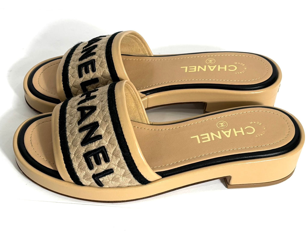 CHANEL LAMBSKIN LEATHER EMBROIDERED LOGO MULES