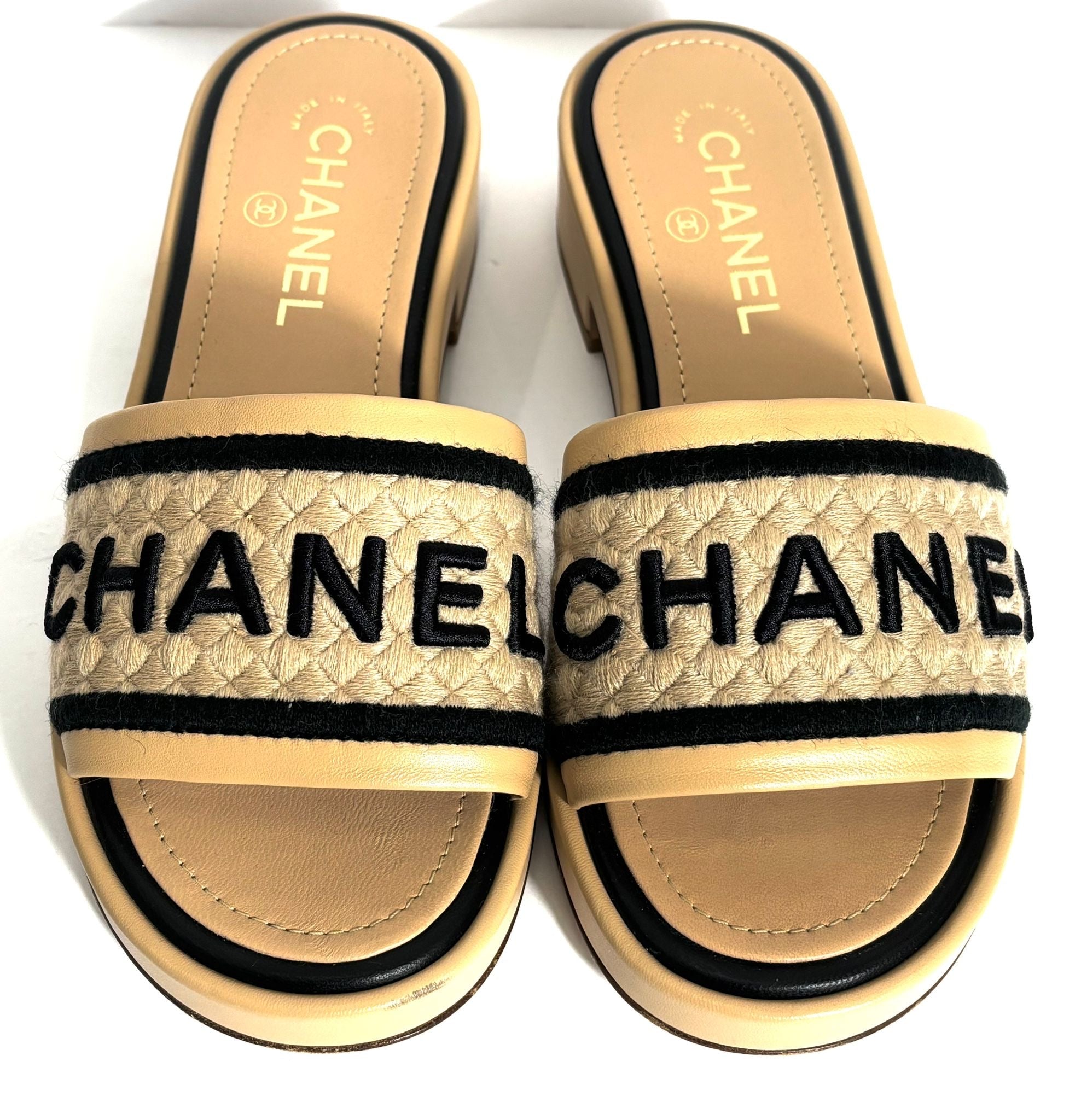 CHANEL LAMBSKIN LEATHER EMBROIDERED LOGO MULES