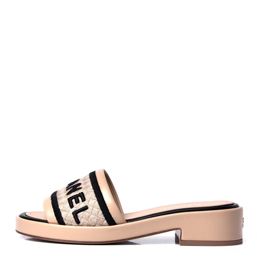 CHANEL LAMBSKIN LEATHER EMBROIDERED LOGO MULES