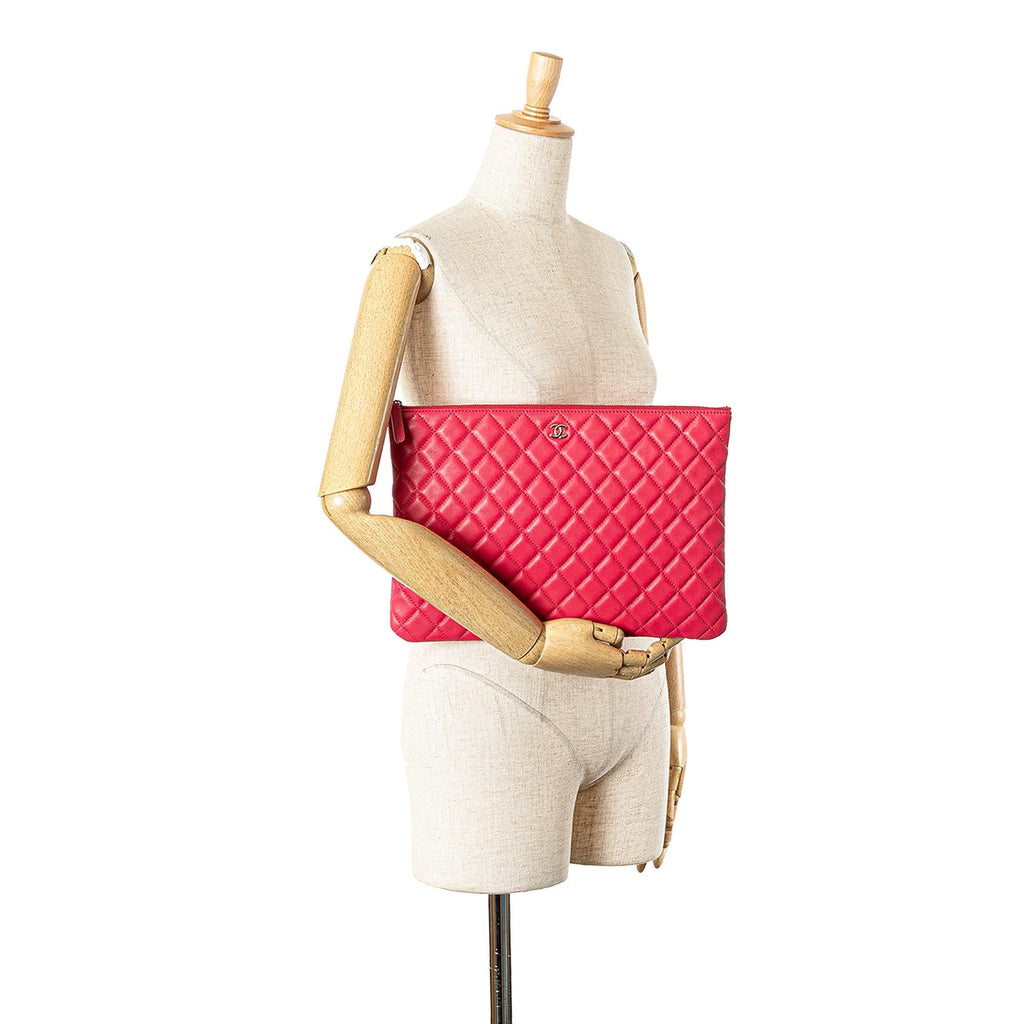 Chanel Large Quilted Lambskin O Case Clutch