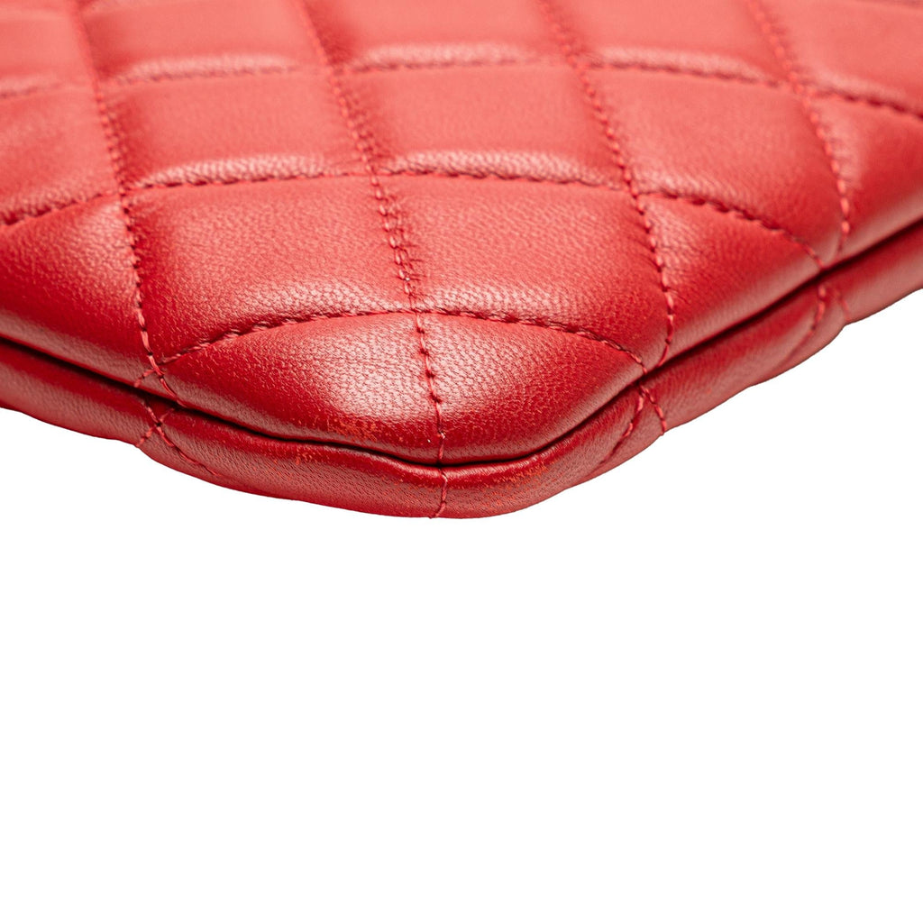 Chanel Medium Quilted Lambskin O Case Clutch