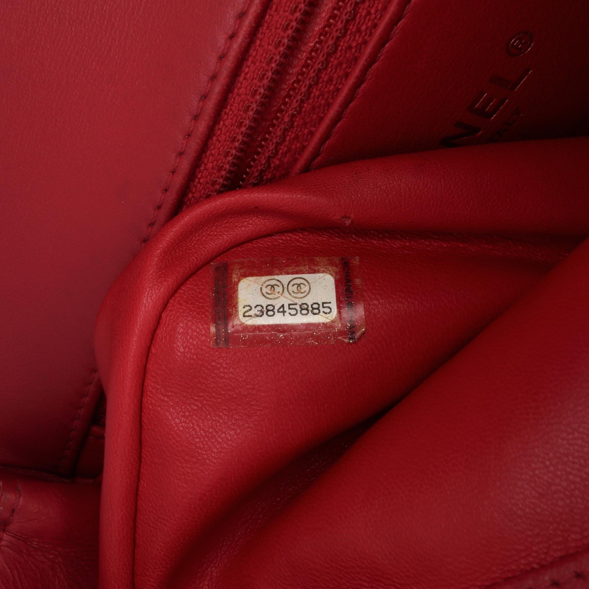 Chanel Mini Quilted Lambskin Carry Chic Flap