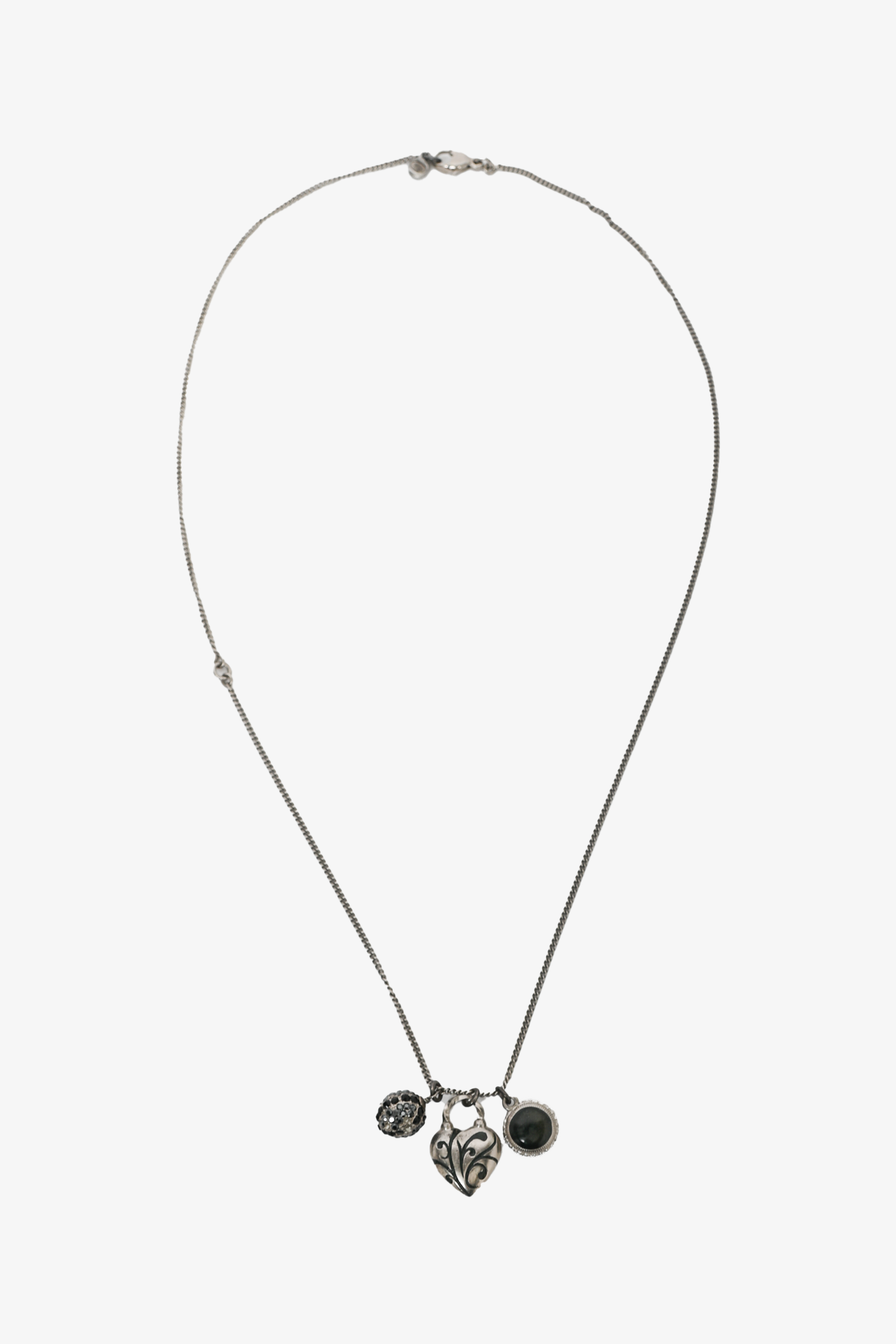 Pre-loved Chanel™ 2009 Silver Tone Heart Shaped CC Charmed Necklace