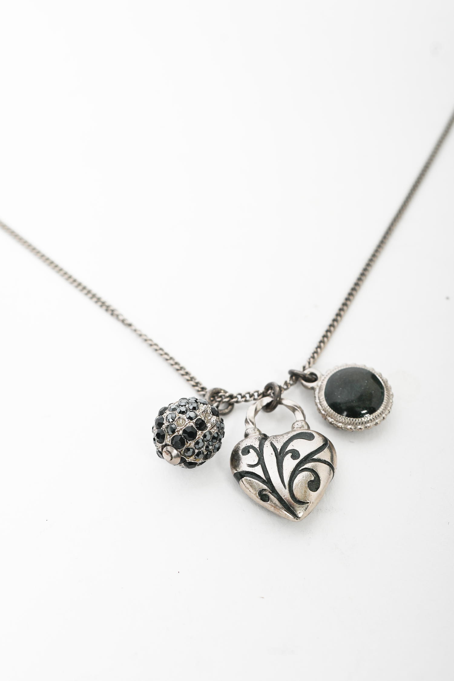 Pre-loved Chanel™ 2009 Silver Tone Heart Shaped CC Charmed Necklace