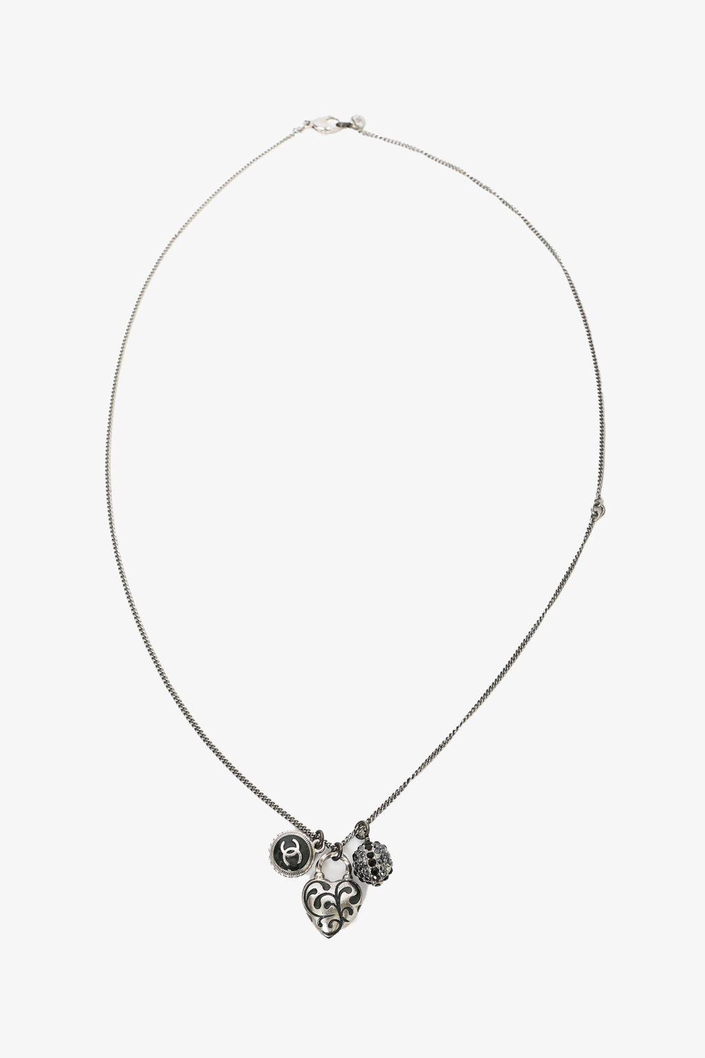 Pre-loved Chanel™ 2009 Silver Tone Heart Shaped CC Charmed Necklace