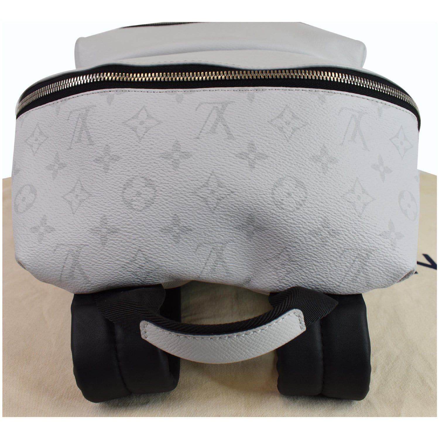 LOUIS VUITTON Discovery PM Taiga Monogram Leather Backpack White