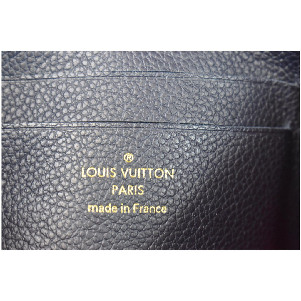LOUIS VUITTON Melanie MM Monogram Empreinte Clutch Bag Black