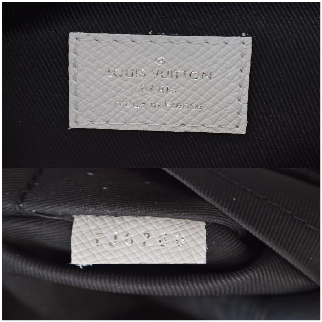 LOUIS VUITTON Discovery PM Taiga Monogram Leather Backpack White
