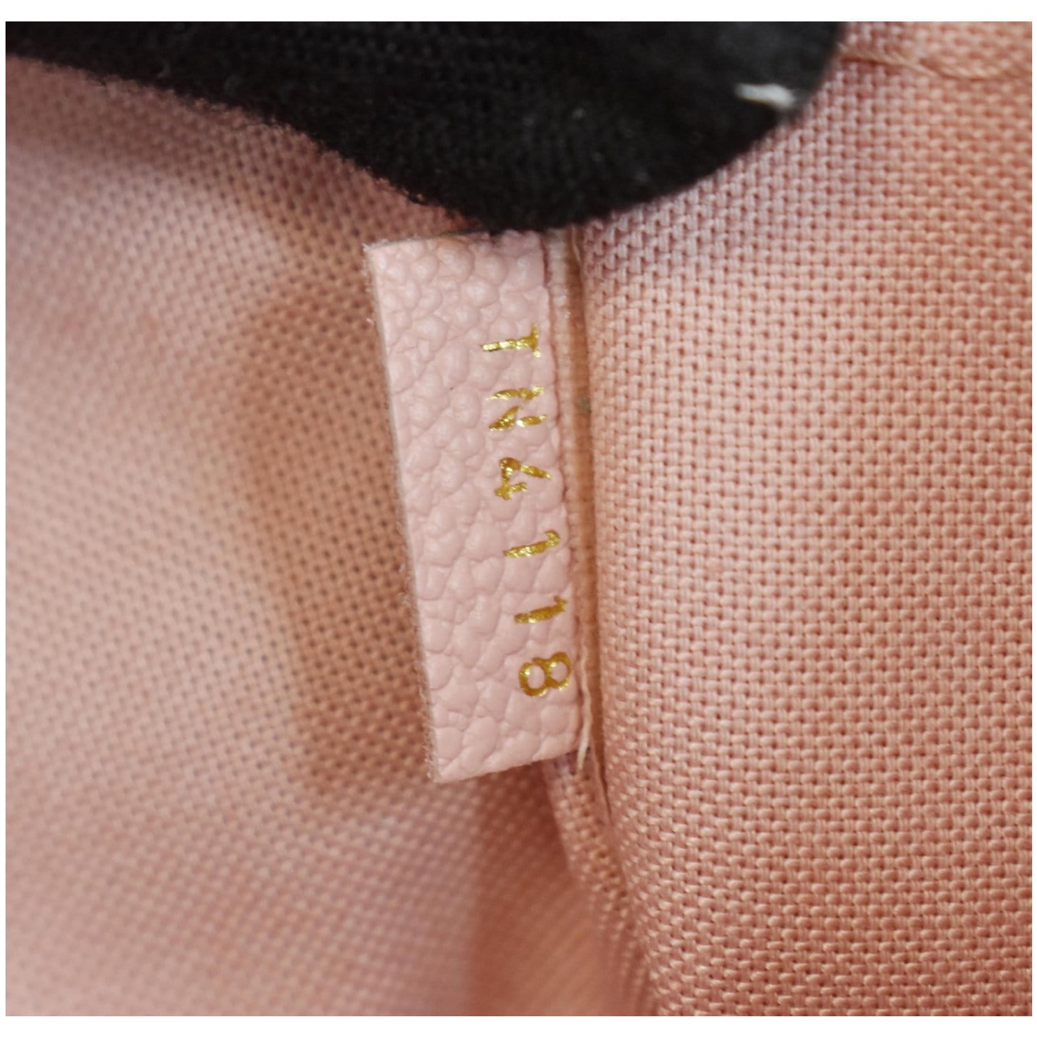 LOUIS VUITTON Daily Pouch Monogram Empreinte Leather Clutch Rose Poudre
