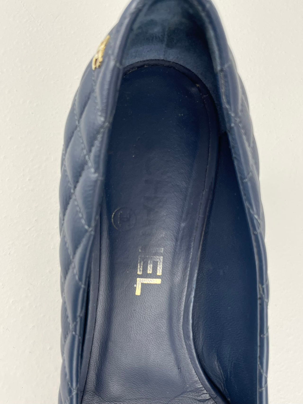 Chanel Navy Black Calfskin Quilted Cap Toe Camellia Pumps 37.5 with Cc Logo