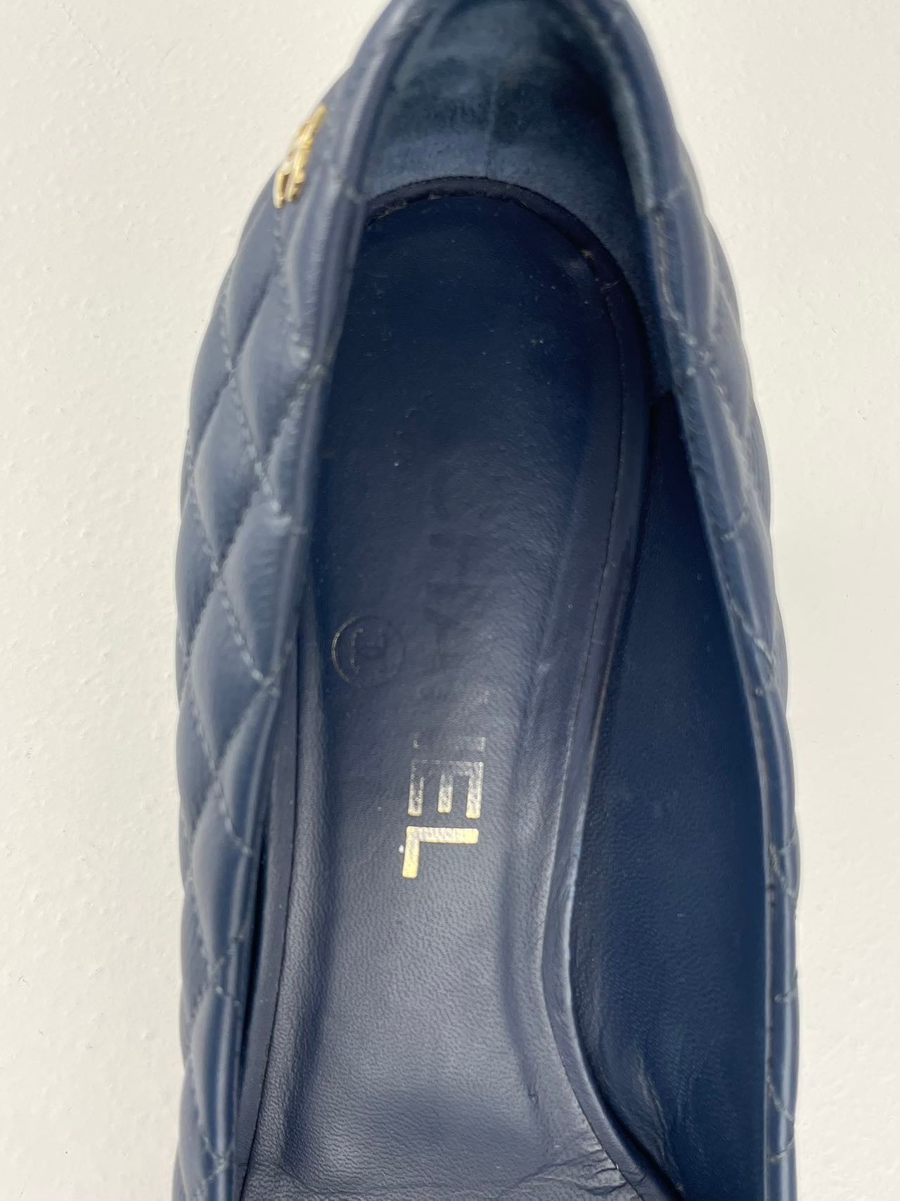 Chanel Navy Black Calfskin Quilted Cap Toe Camellia Pumps 37.5 with Cc Logo