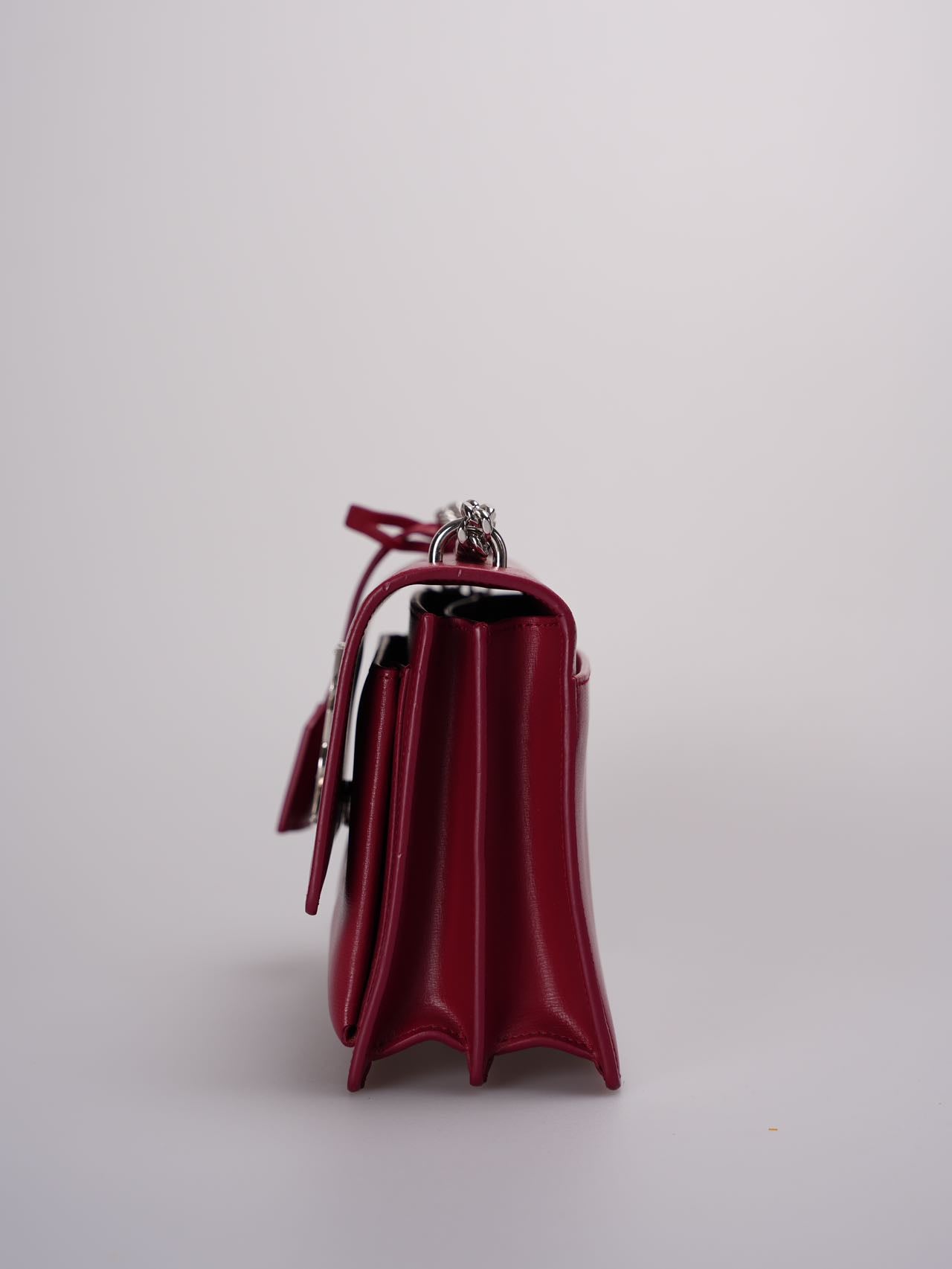 Saint Laurent Calfskin Medium Monogram Sunset shoulder bag in Rouge