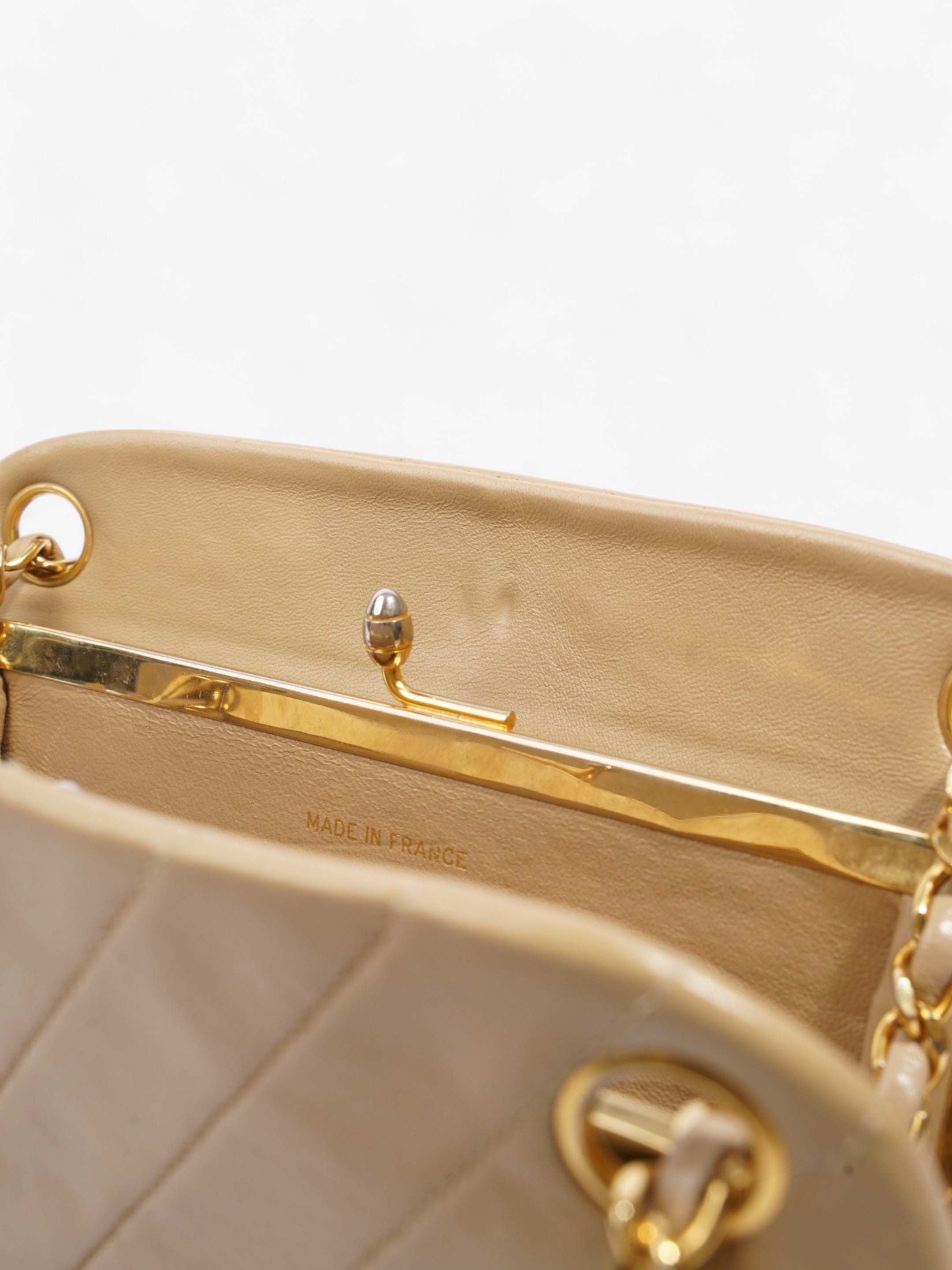 Chanel Kiss Lock Beige Lambskin Leather