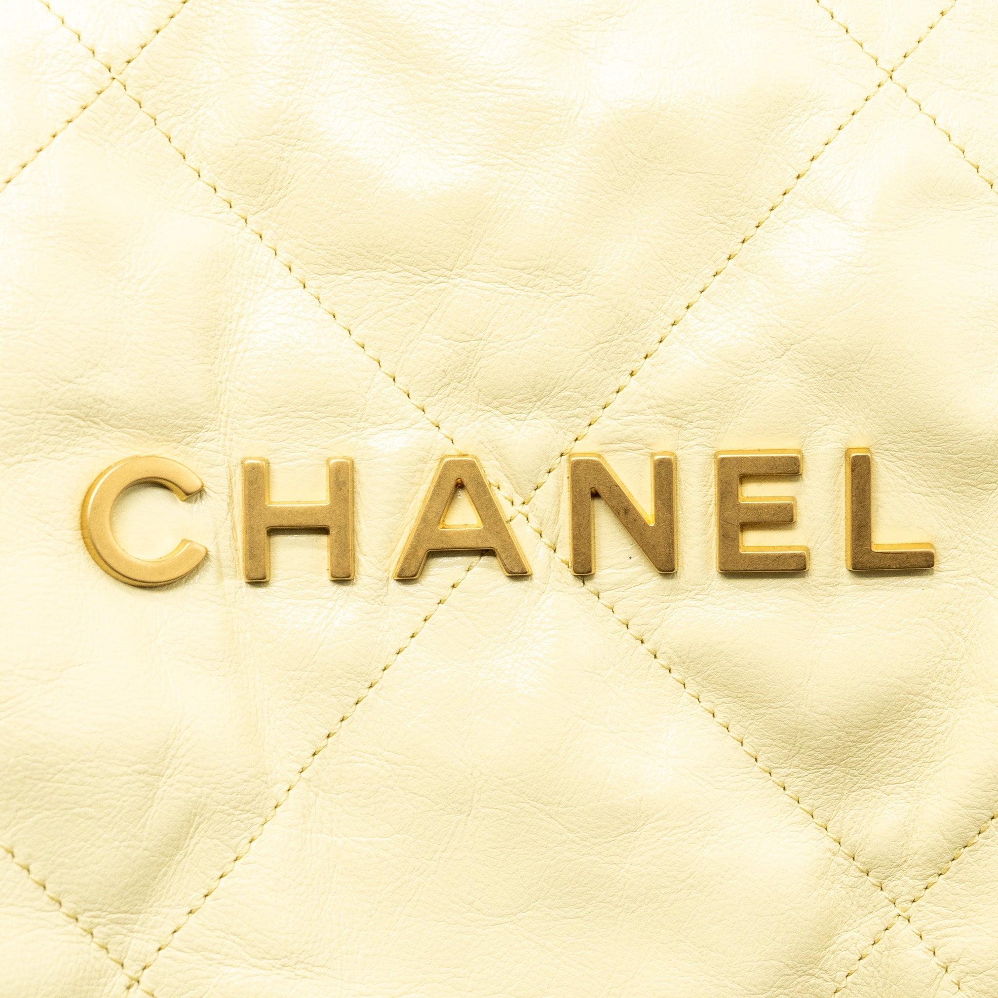 Chanel 23P Small 22 Backpack Shiny Calfskin Light Yellow Brushed (Microchip)