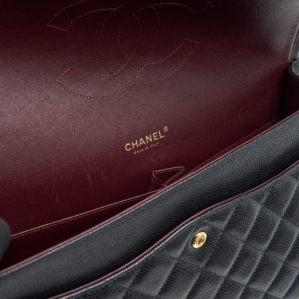 Chanel Maxi Classic Double Flap Caviar black  serial 20