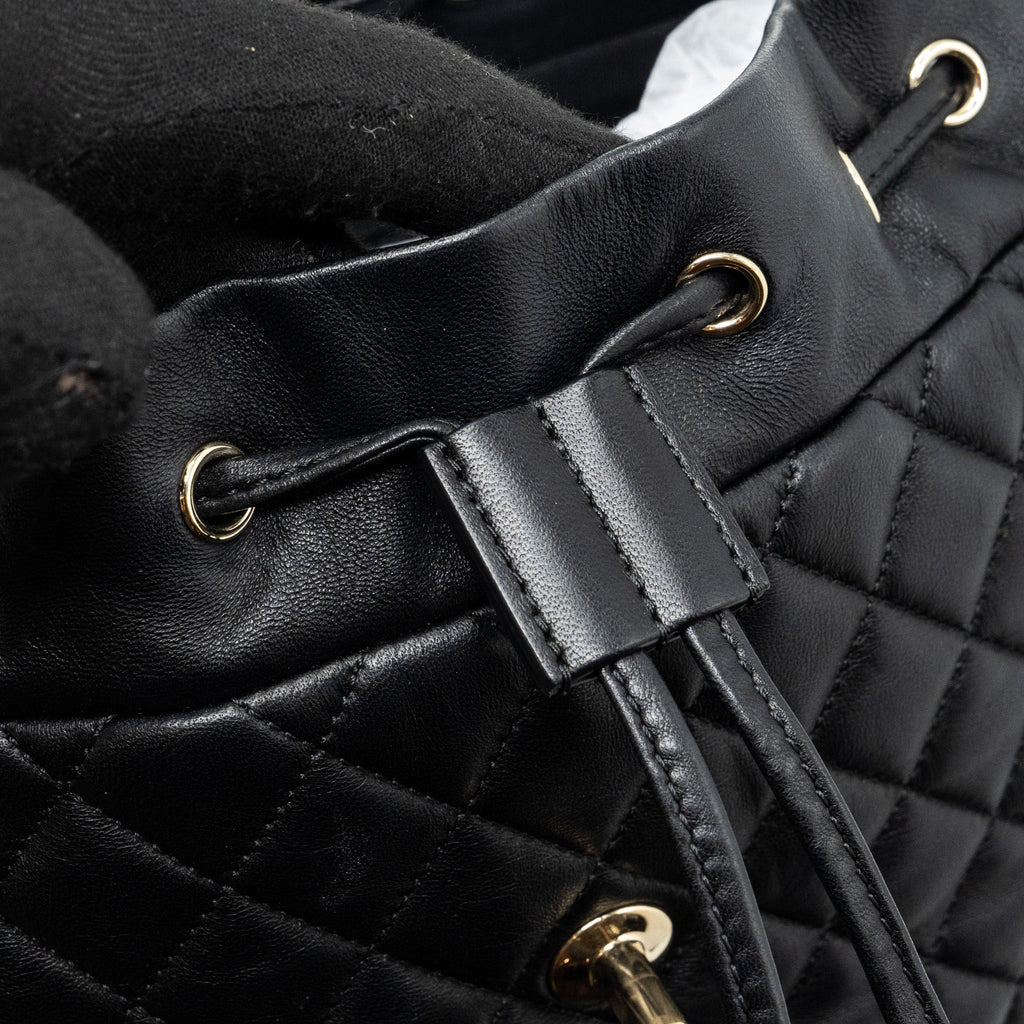 Chanel quilted flap backpack lambskin black