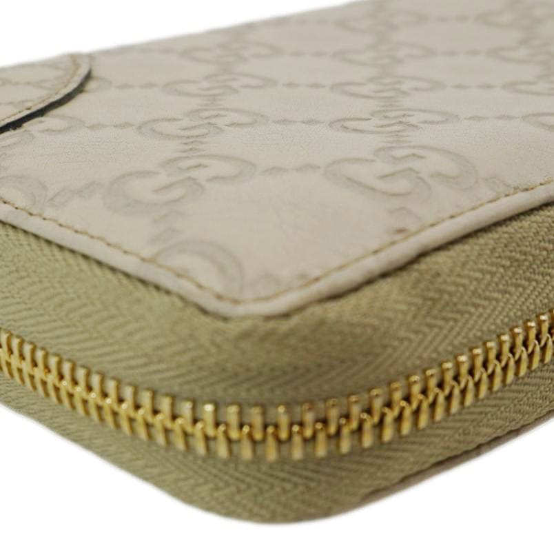 GUCCI GG Canvas Zippy Wallet White 323397