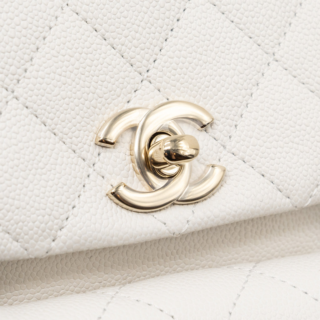 Chanel 23k Triple Pocket Mini Backpack Caviar White L(Microchip)