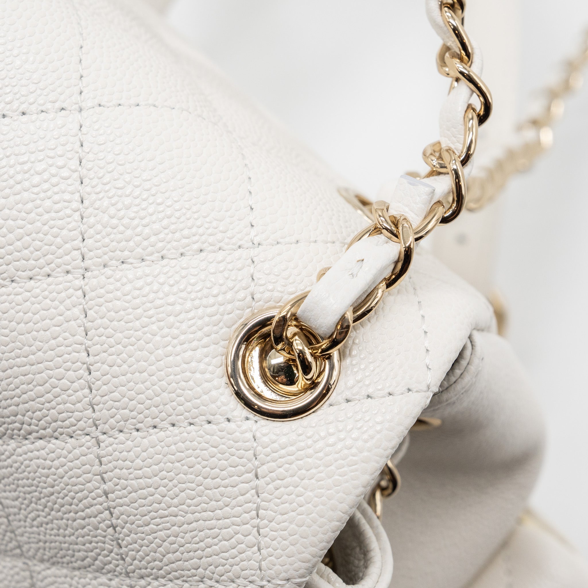 Chanel 23k Triple Pocket Mini Backpack Caviar White L(Microchip)