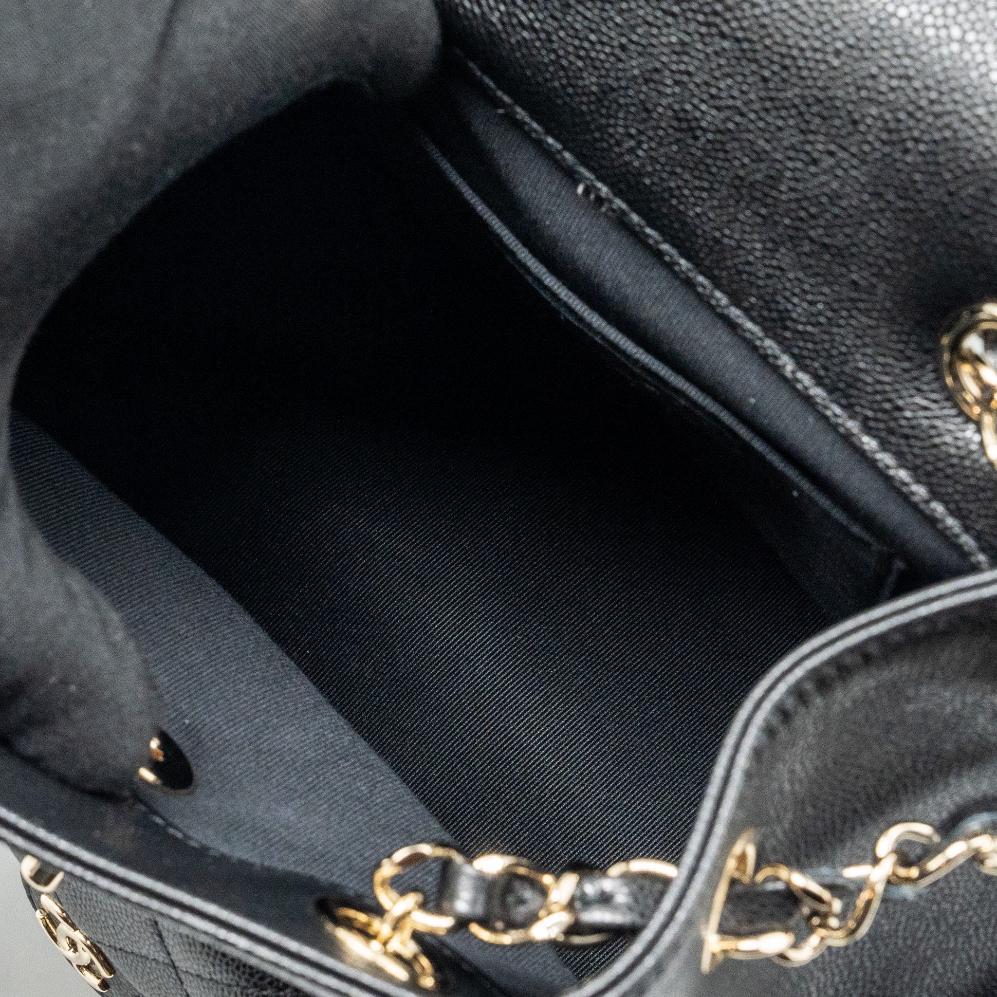 Chanel Triple Pocket Backpack Caviar Black L (Microchip)