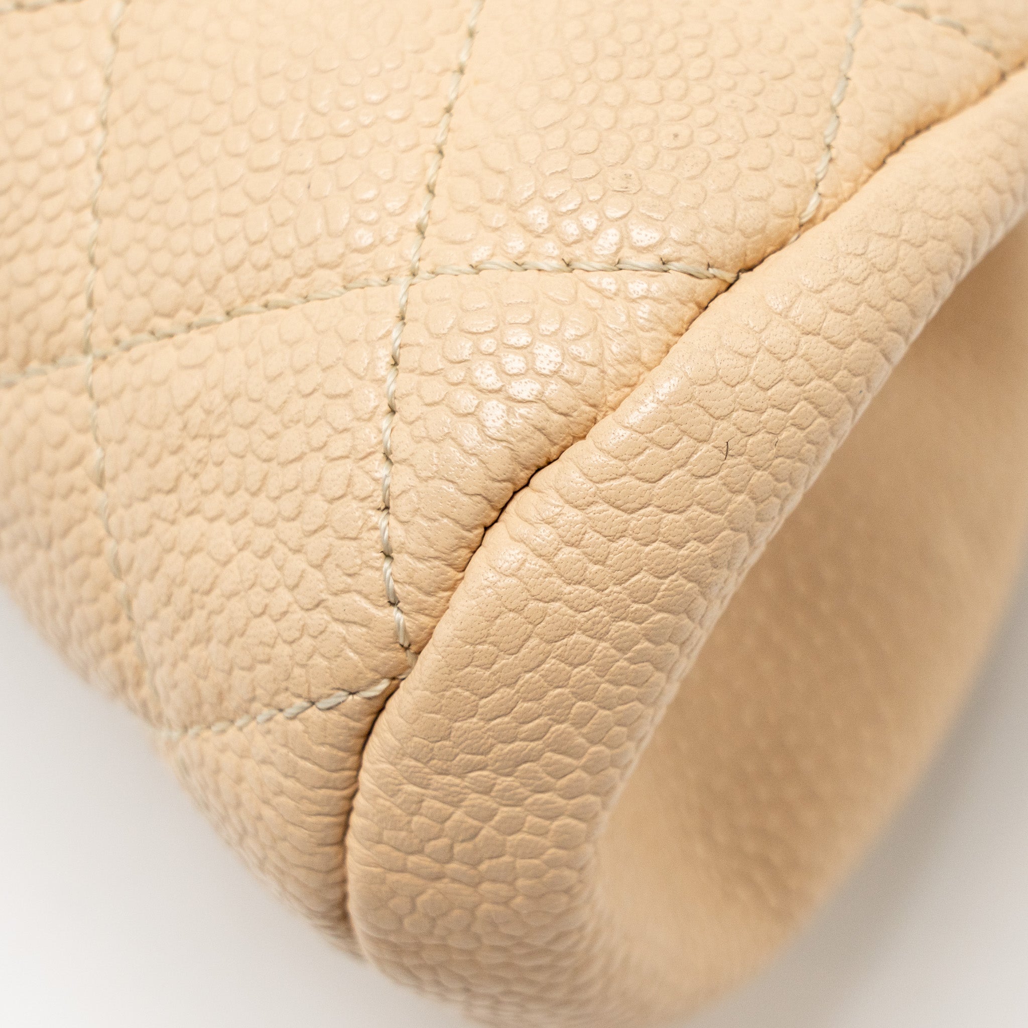 Chanel timeless kisslock clutch caviar beige