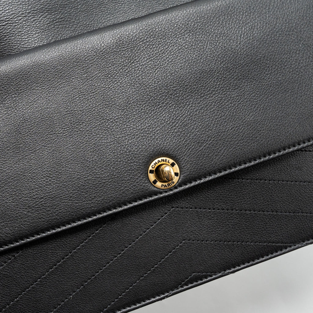 Chanel Voyage Chevron Clutch Calfskin Black