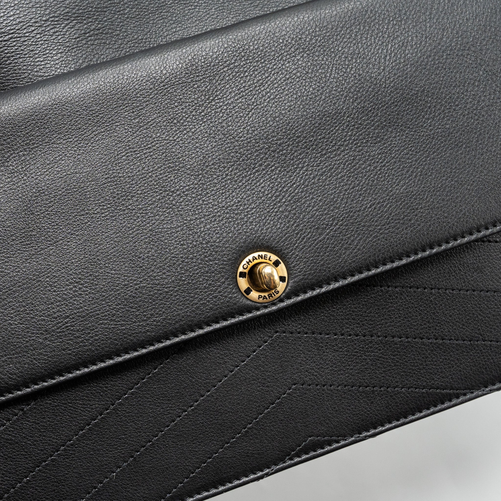 Chanel Voyage Chevron Clutch Calfskin Black