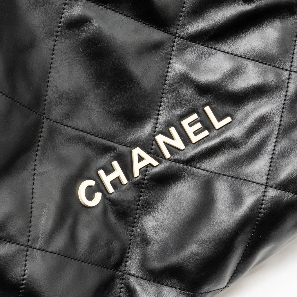 Chanel 22 Backpack White Letter Logo Shiny Calfskin Black  (Microchip)