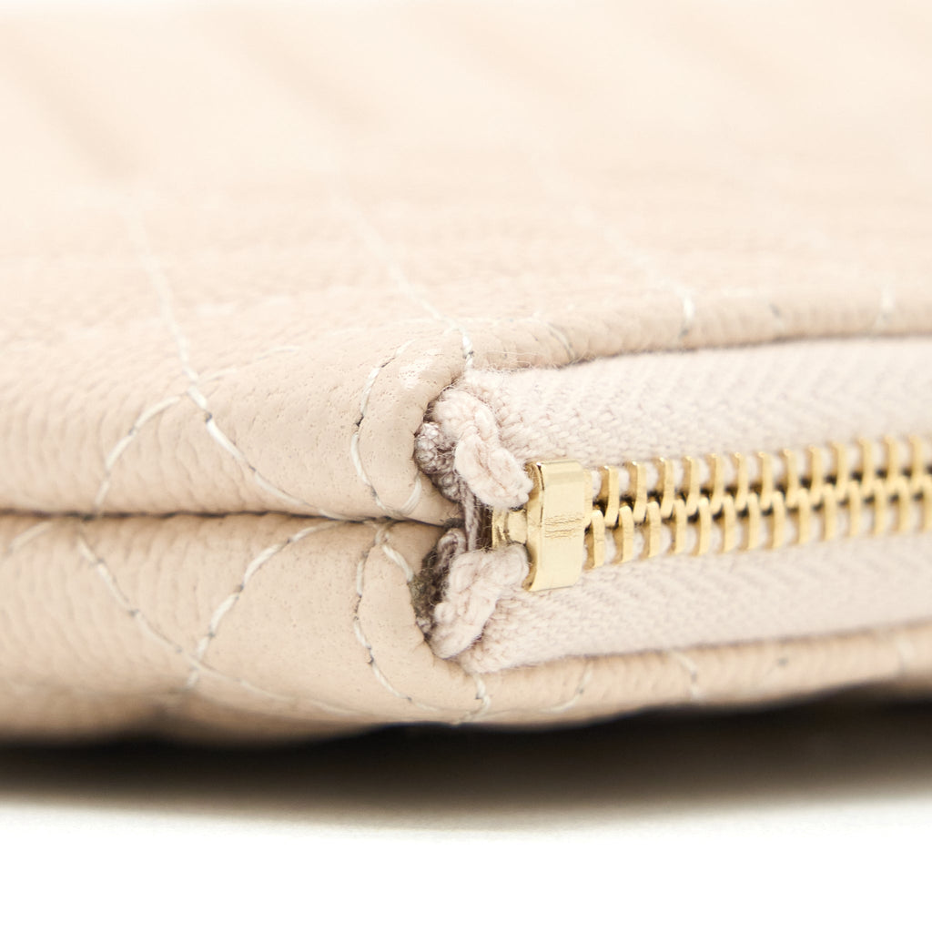 Chanel Clutch Chevron Caviar Beige