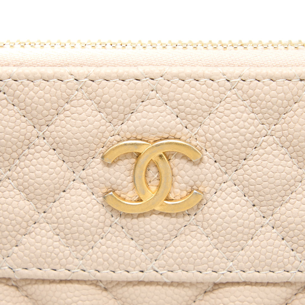Chanel Clutch Chevron Caviar Beige